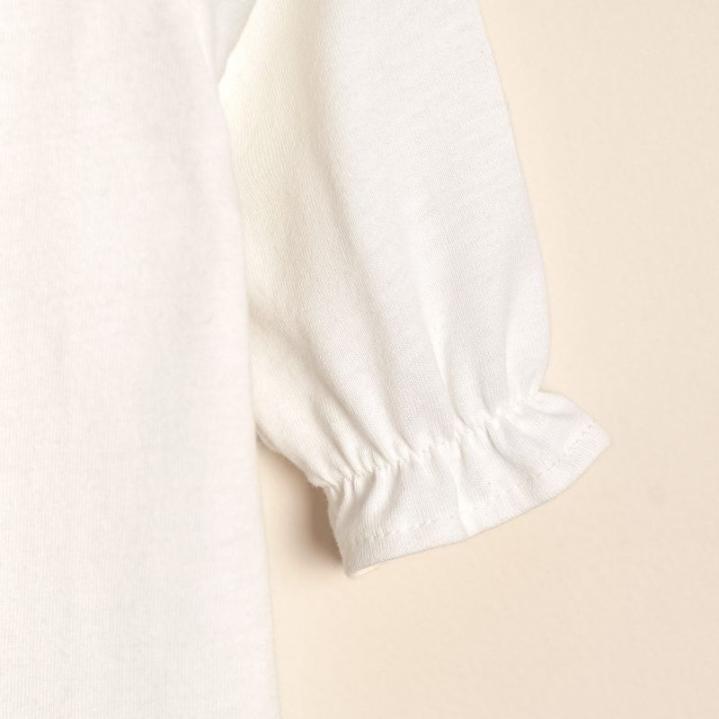 enterito cuello estampado oso crudo